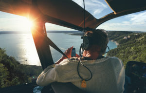 tourist on airplane cuiser tour taking pictures